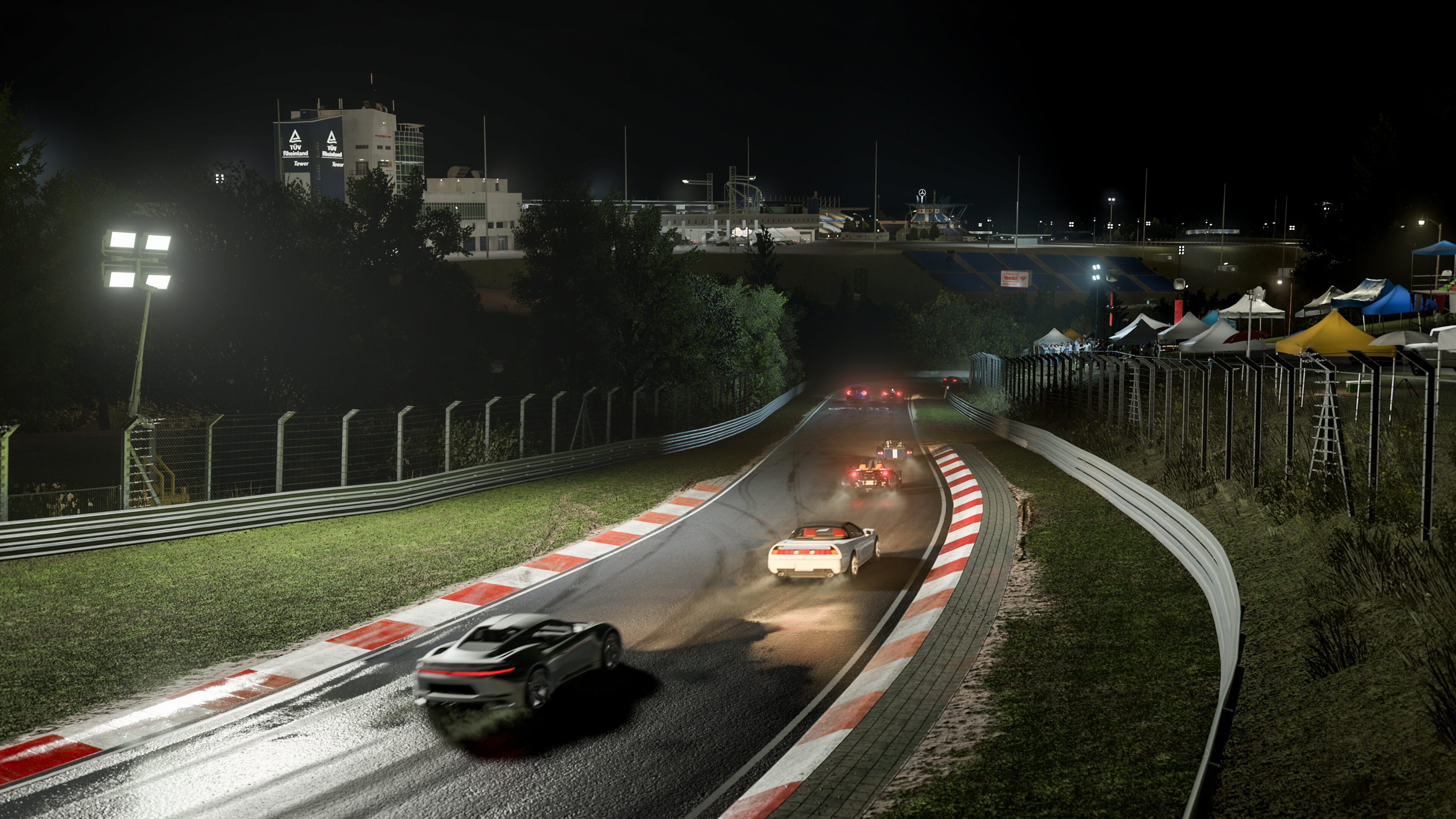 Cars on a race track at dusk in Forza Motorsport