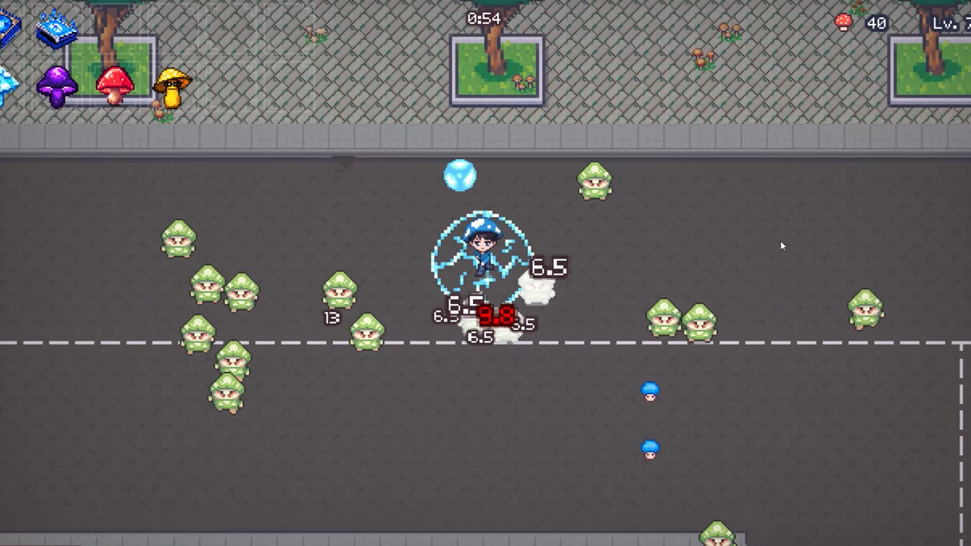 The image shows a top-down view of a pixel-art style video game where a character dressed in blue is surrounded by multiple small green mushroom-like enemies on a dark gray street. The character appears to be protected by a blue electrical shield, and there are various damage numbers, including a prominent red "9.8," displayed near the character, indicating ongoing combat. The scene includes a paved sidewalk with small green patches and trees at the top, along with clusters of colorful mushrooms in blue, purple, red, and yellow located near the edge of the sidewalk.