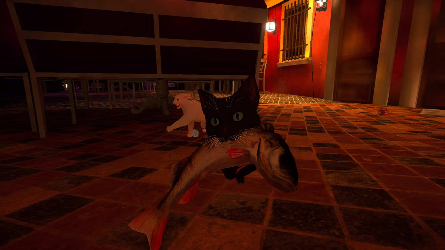 A black cat carries a fish past cafe furniture with a white rival cat close behind.