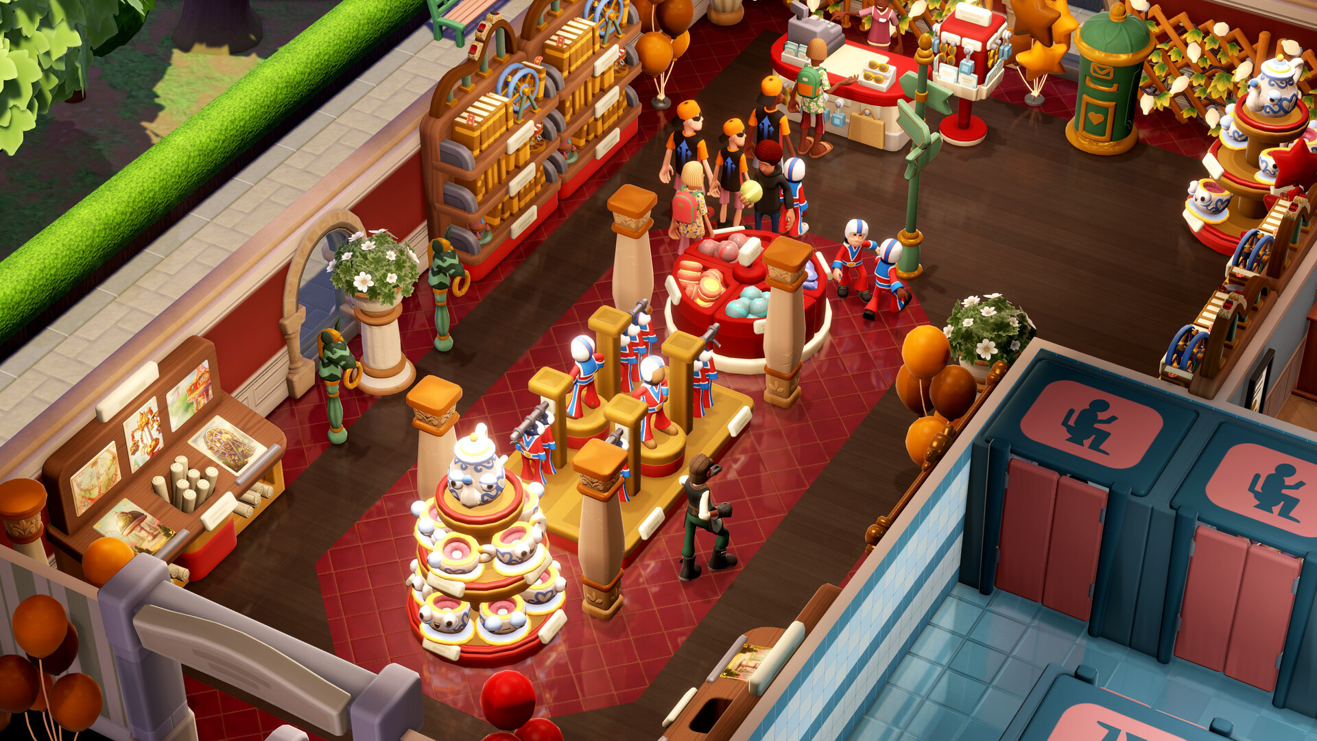 Guests browse a Two Point Museum gift shop stocked with funfair merchandise beside a display of costumed performer figures on plinths