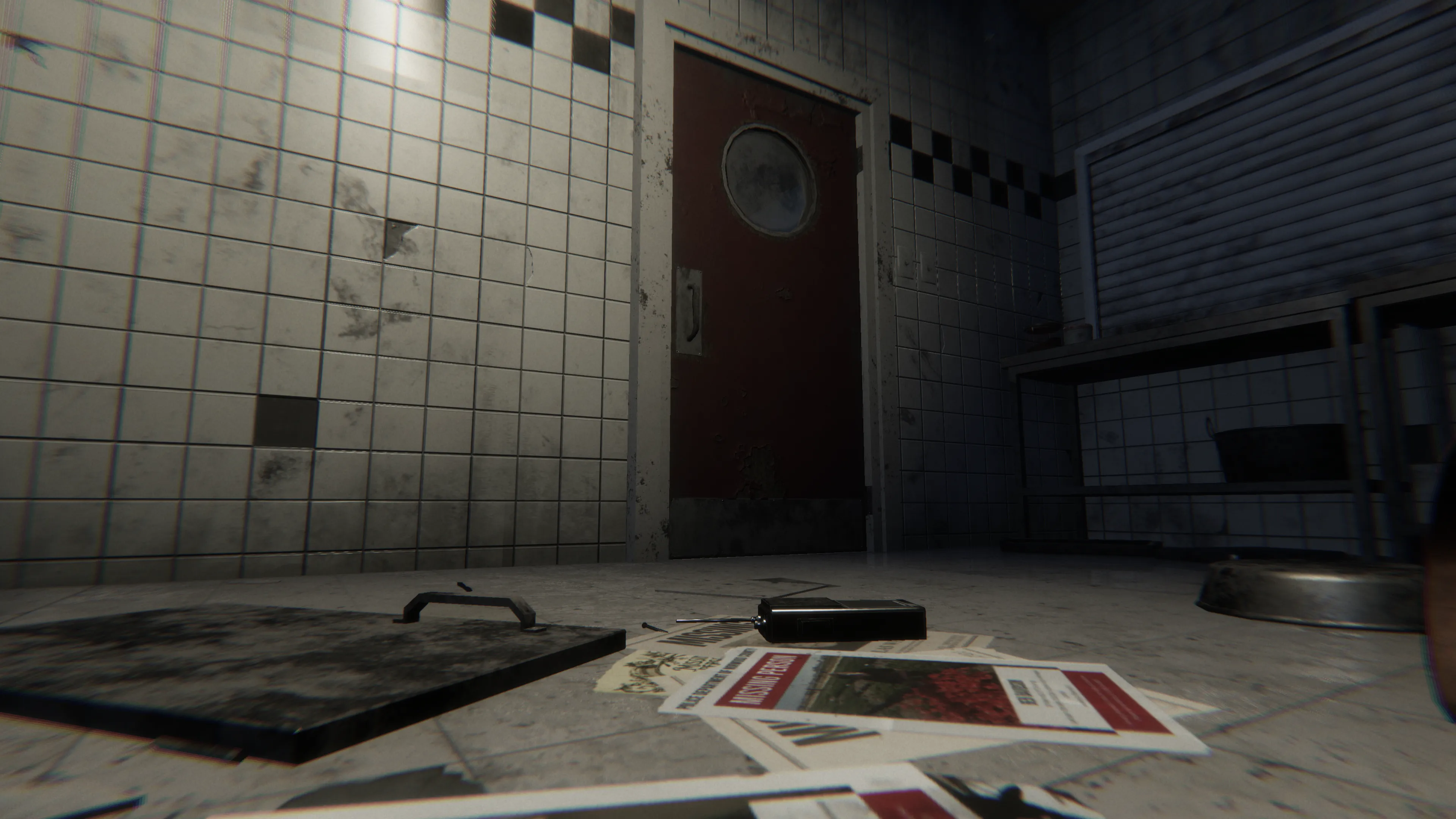 A destroyed kitchen with a walkie-talkie on the floor