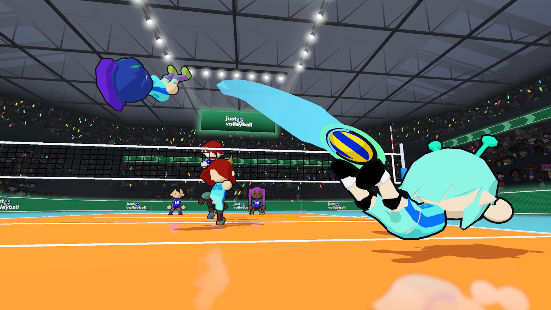 Official just volleyball screenshot: a player with a round mint head and antenna dives full stretch to dig a blue and yellow ball with a glowing aim ring, while a teammate flips through the air under stadium lights and a packed crowd watches an orange indoor court (temkosoft)