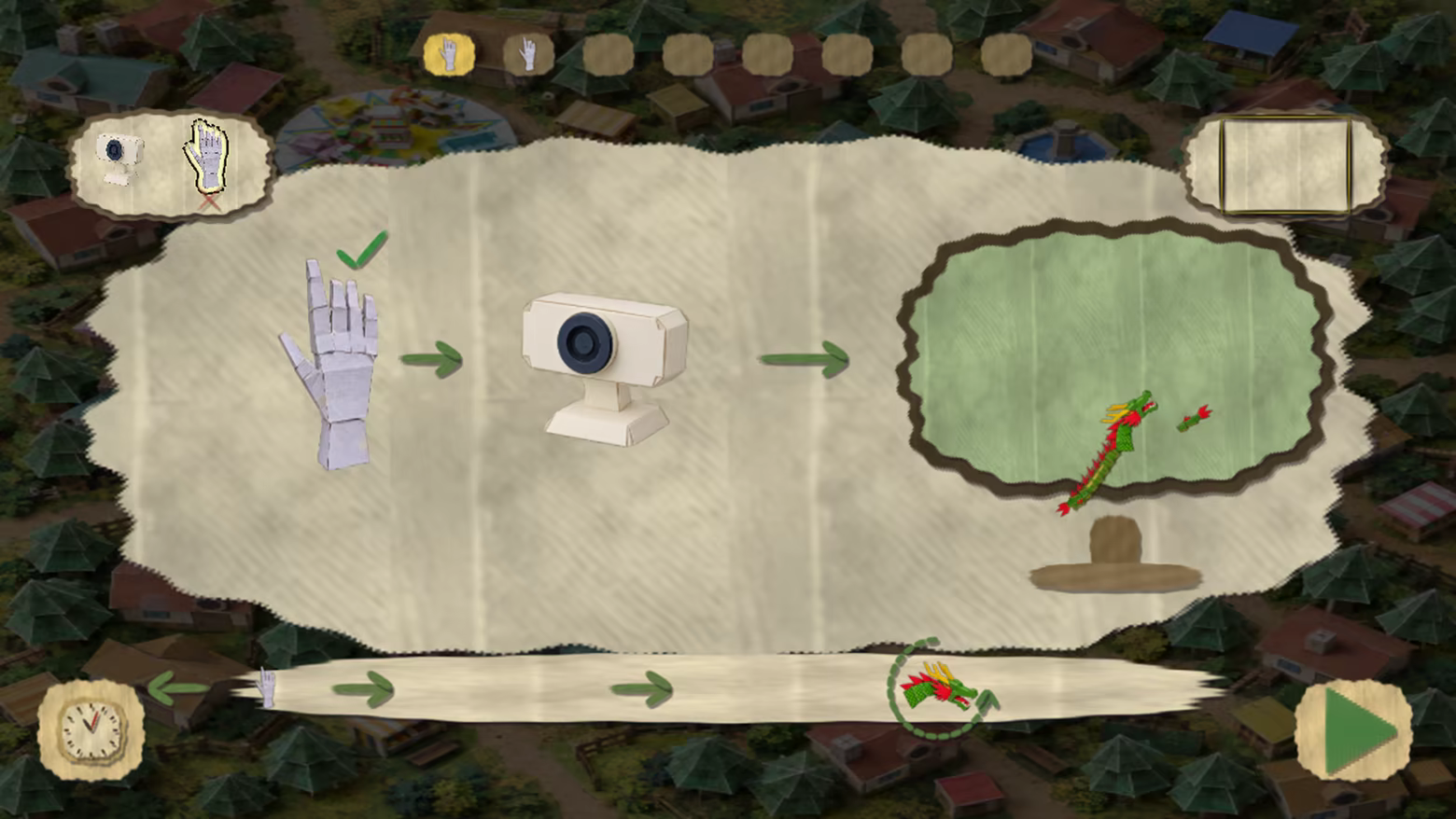 Paper pictogram showing an open hand, a webcam, and the paper dragon in a stage; hand movement can control the dragon.